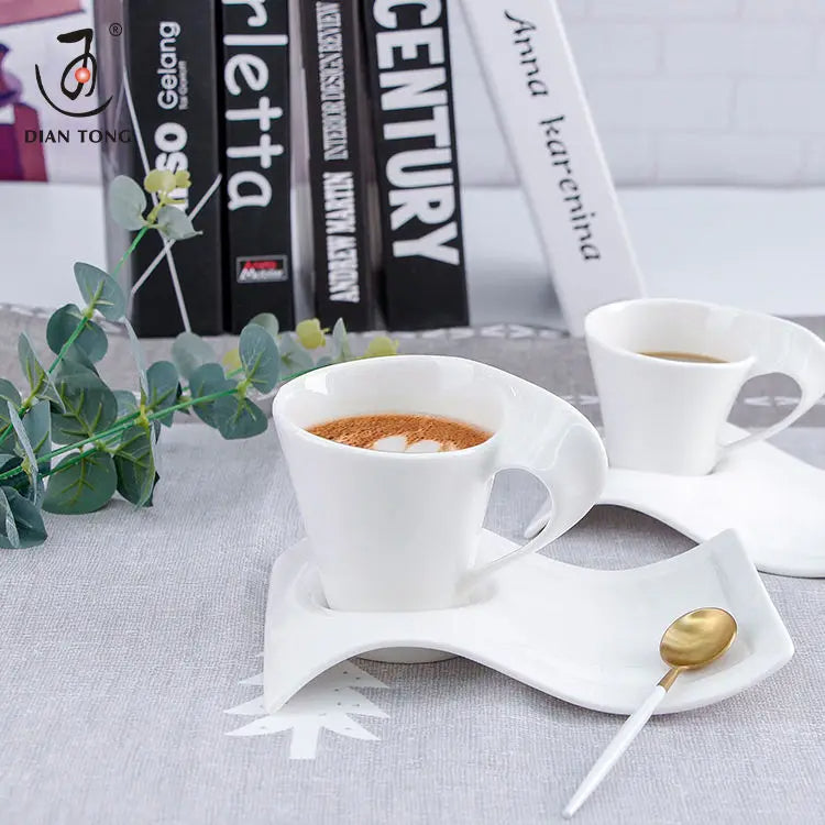 white creative wave coffee cups and saucers