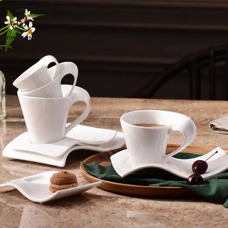 white creative wave coffee cups and saucers