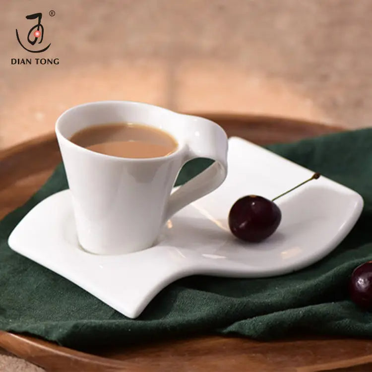 white creative wave coffee cups and saucers