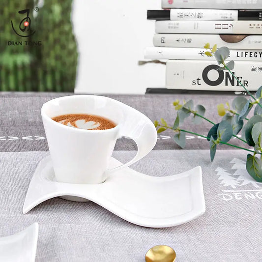 white creative wave coffee cups and saucers