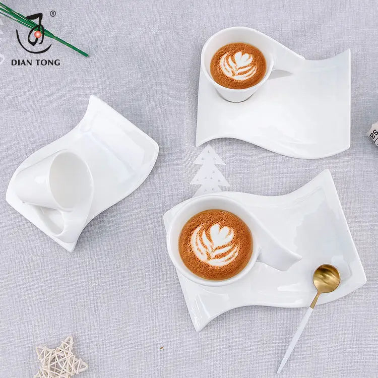 white creative wave coffee cups and saucers