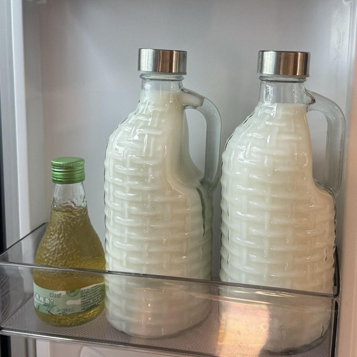 Versatile Large Glass Bottle with Handle for Drinks, Milk, Oil Storage