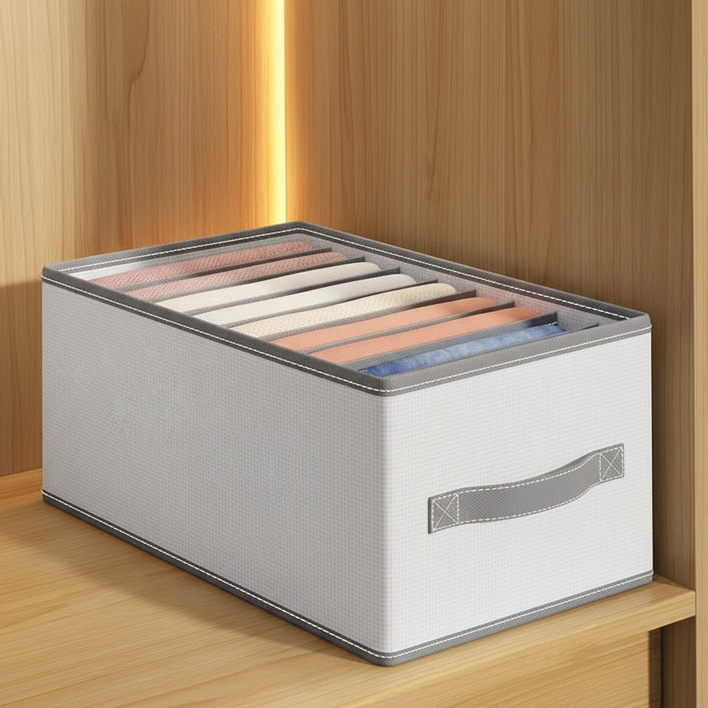 A large white fabric drawer organizer box with a handle, shown on a wooden shelf with folded garments inside. The image includes dimension labels (44 cm, 28 cm, 20 cm) and Chinese text overlays indicating capacity and use cases.